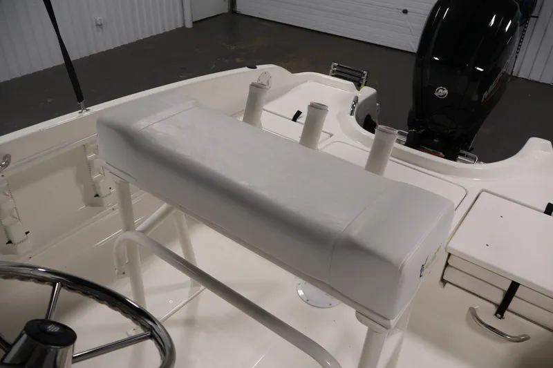 Slide: The Image of 2026 Bayliner Trophy T18 boat interior with seating and steering wheel. - 31