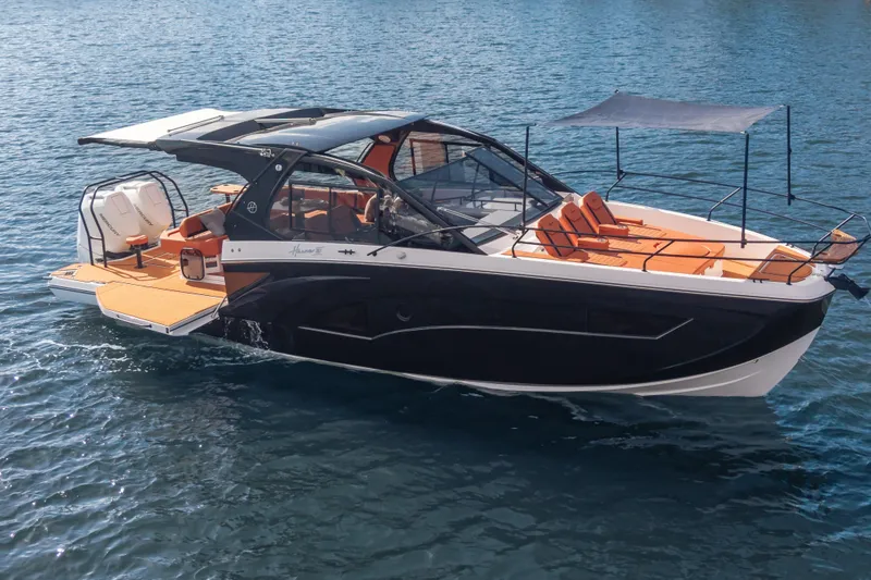 Slide: The Image of 2026 Hanover 387 luxury boat on water, featuring sleek design and spacious deck. - 38