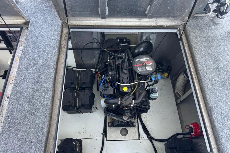 Slide: The Image of Engine compartment of a 2004 Starlite 65x16 with Mercury MerCruiser 3.0 motor. - 79