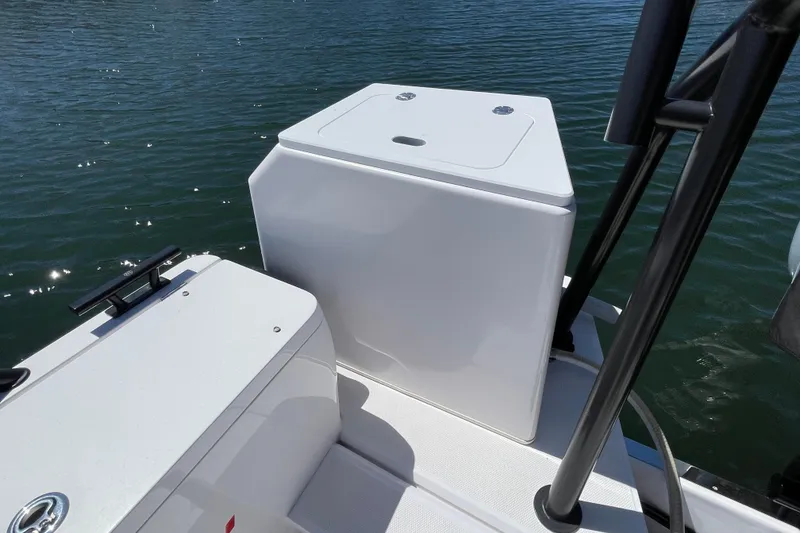 Slide: The Image of 2022 Axopar Brabus 28 Cabin boat detail with sleek white design on water. - 29