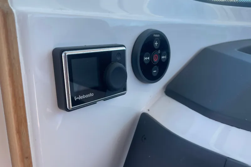 Slide: The Image of Control panel of 2022 Axopar Brabus 28 Cabin with Webasto and Fusion systems. - 46