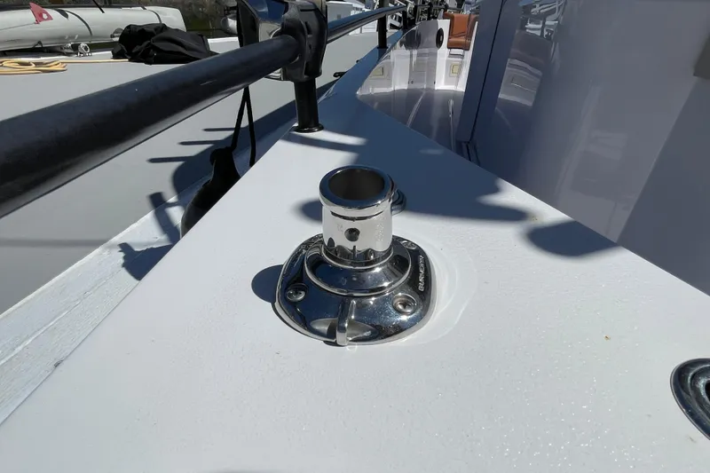 Slide: The Image of Close-up of a 2022 Axopar Brabus 28 Cabin boat deck detail with metal fitting. - 53
