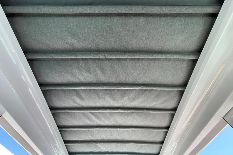 Slide: The Image of Roof interior of 2022 Axopar Brabus 28 Cabin boat, featuring sleek design elements. - 54