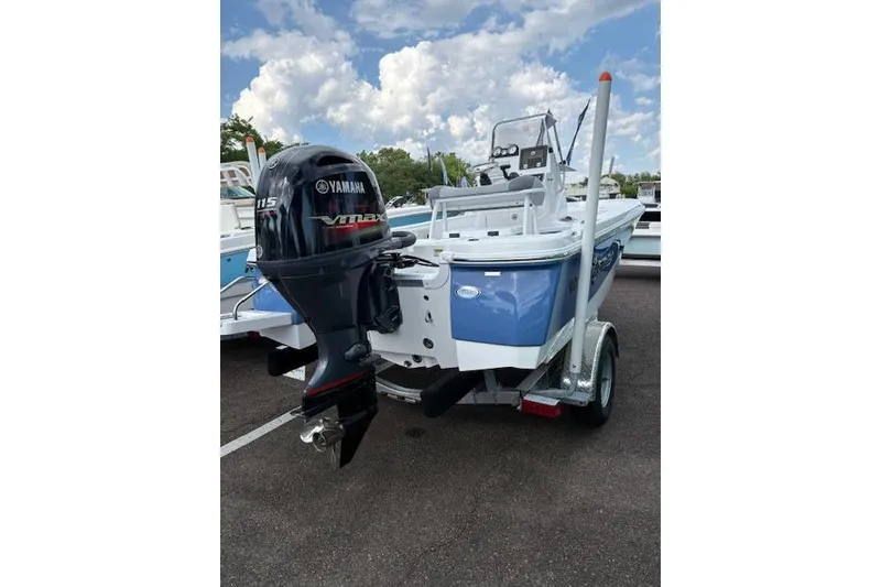 Slide: The Image of 2026 NauticStar 194 Bay boat with Yamaha 115 VMAX engine on trailer. - 5