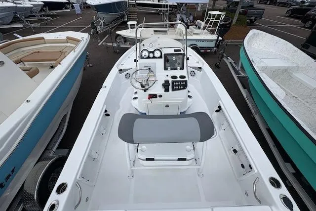 Slide: The Image of 2026 NauticStar 194 Bay boat interior with modern dashboard and seating. - 6