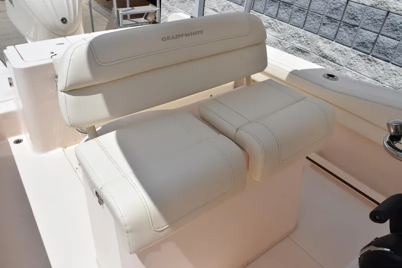 Slide: The Image of 2024 Grady-White Fisherman 236 boat seating, featuring luxurious white upholstery. - 10
