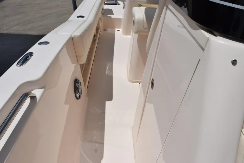 Slide: The Image of 2024 Grady-White Fisherman 236 boat interior, featuring sleek design and comfortable seating. - 15