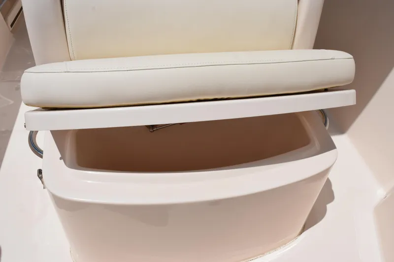 Slide: The Image of 2024 Grady-White Fisherman 236 boat seat with storage compartment. - 18