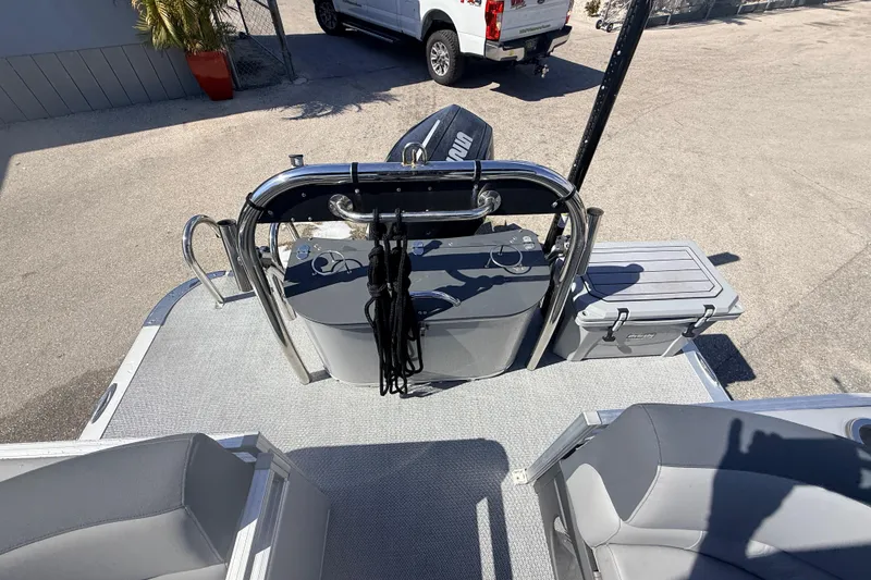Slide: The Image of 2026 Avalon 2485 LSZ Quad Lounger boat interior with seating and storage compartments. - 14