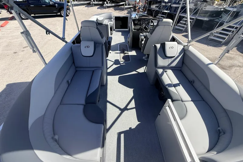 Slide: The Image of 2026 Avalon 2485 LSZ Quad Lounger Tri Toon interior with gray seating and modern dashboard. - 8