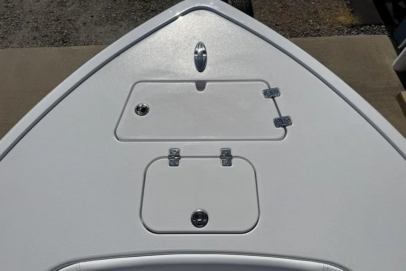 Slide: The Image of Bow deck of 2026 Sportsman Masters 247OE Bay Boat with storage compartments. - 10