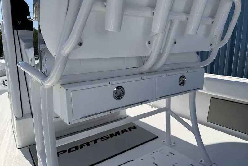 Slide: The Image of 2026 Sportsman Masters 247OE Bay Boat interior with storage compartments and seating. - 19