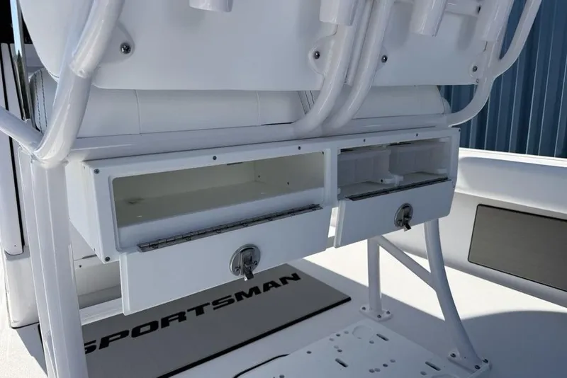 Slide: The Image of 2026 Sportsman Masters 247OE Bay Boat storage compartments and seating detail. - 21