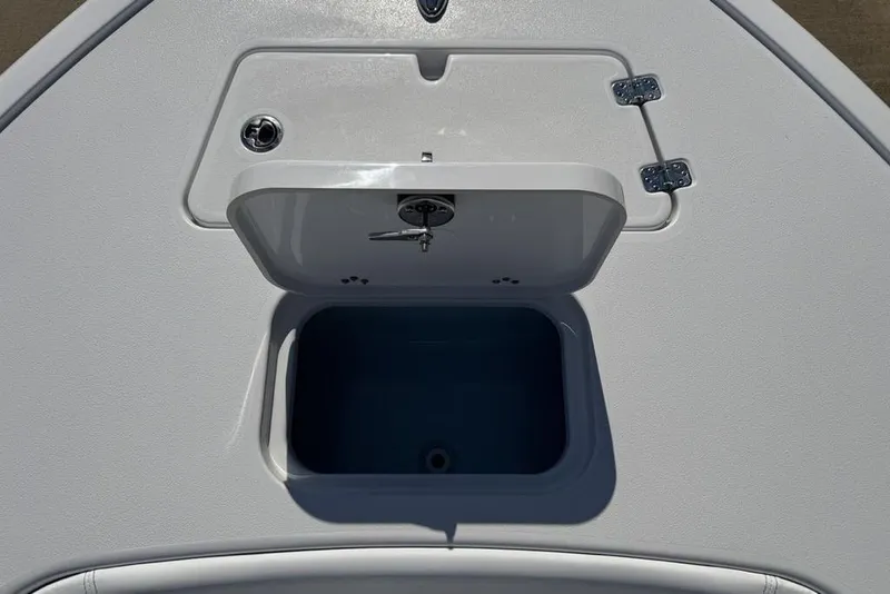 Slide: The Image of Open storage compartment on 2026 Sportsman Masters 247OE Bay Boat deck. - 8