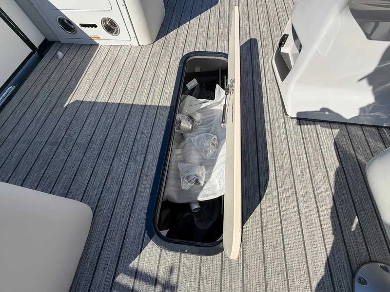 Slide: The Image of Storage compartment in Harris Cruiser 210 SL boat, 2025 model. - 16