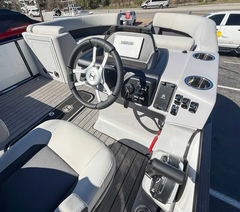 Slide: The Image of Interior view of 2025 Harris Cruiser 210 SL helm. - 19