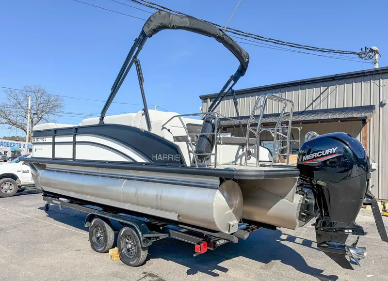Slide: The Image of 2025 Harris Cruiser 210 SL pontoon boat with Mercury engine. - 8