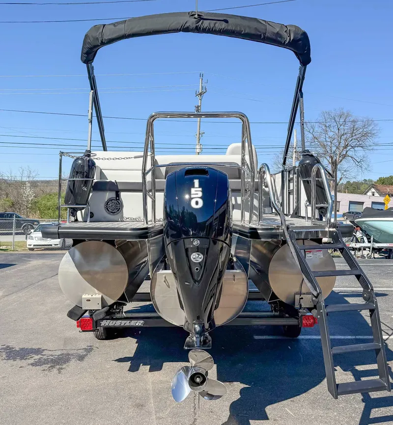 Slide: The Image of 2025 Harris Cruiser 210 SL with 150 HP outboard motor. - 9