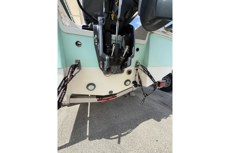 Slide: The Image of 2021 Robalo R180 Center Console boat engine and transom view. - 22