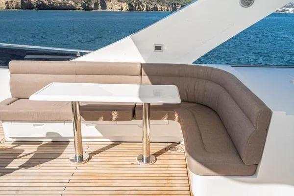 Slide: The Image of Luxurious 2023 Massimo Marine Sunbird yacht deck with elegant seating and ocean view. - 18