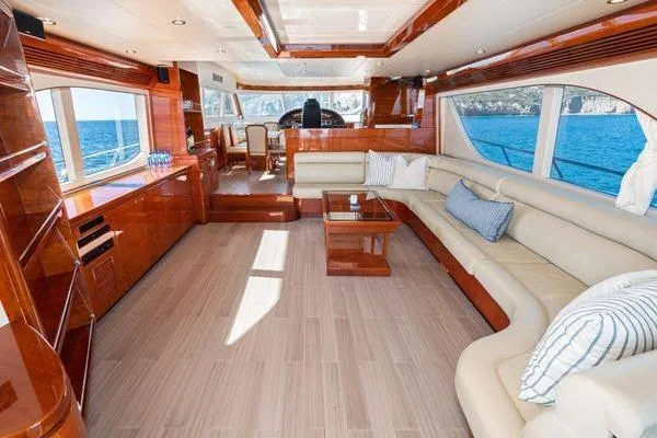 Slide: The Image of Luxurious 2023 Massimo Marine Sunbird yacht interior with elegant wood finishes and ocean view. - 23