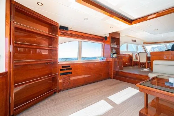 Slide: The Image of Luxurious 2023 Massimo Marine Sunbird yacht interior with elegant wood finishes and panoramic ocean views. - 24