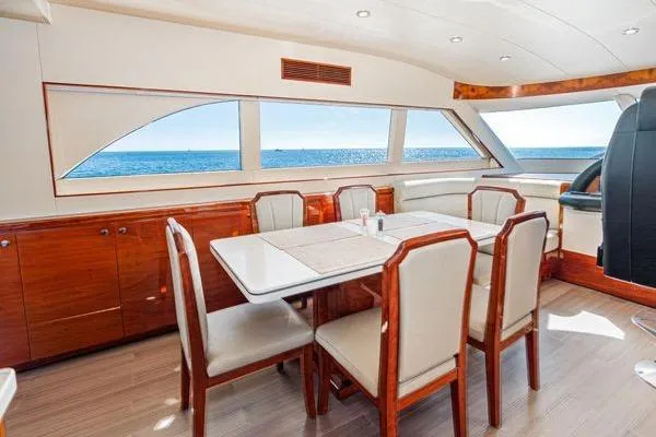 Slide: The Image of Luxurious 2023 Massimo Marine Sunbird yacht interior with elegant dining area and ocean view. - 31