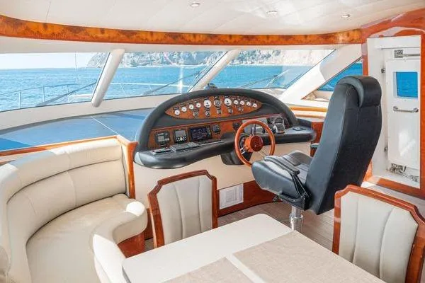 Slide: The Image of Luxurious 2023 Massimo Marine Sunbird yacht interior with elegant seating and advanced control panel. - 32