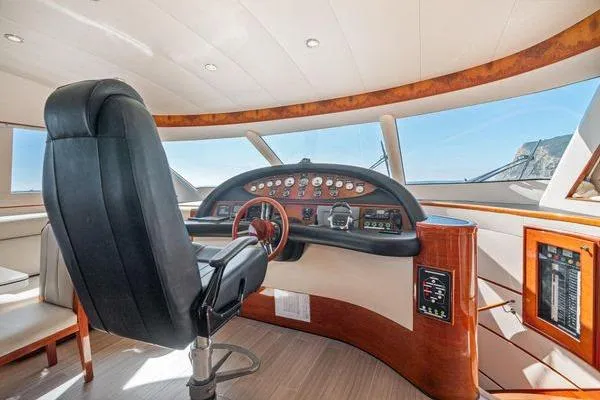 Slide: The Image of Luxurious 2023 Massimo Marine Sunbird yacht interior with modern helm and panoramic windows. - 33