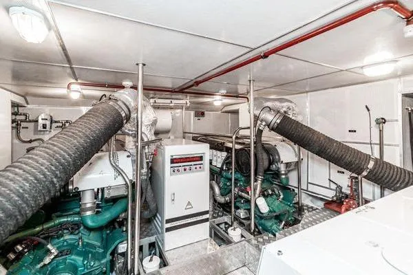 Slide: The Image of Engine room of 2023 Massimo Marine Sunbird boat with dual engines and control panel. - 51