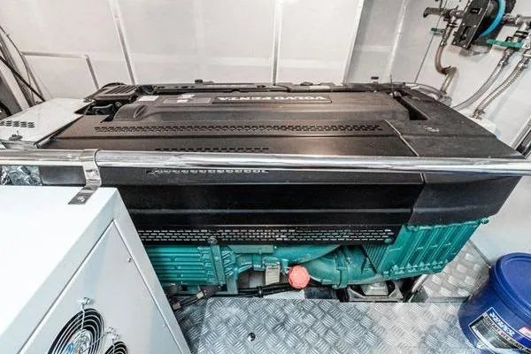 Slide: The Image of Engine room of 2023 Massimo Marine Sunbird boat, featuring a powerful Volvo Penta engine. - 54