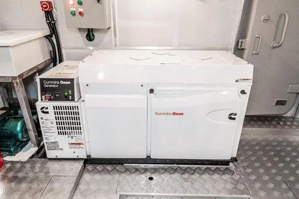Slide: The Image of Cummins Onan generator in 2023 Massimo Marine Sunbird engine room. - 55
