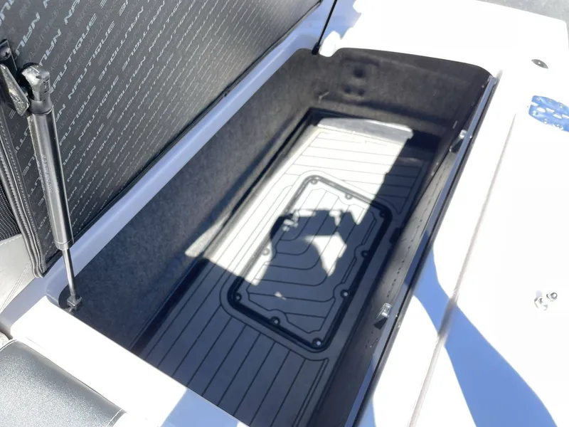 Slide: The Image of Storage compartment in Nautique G25 boat, year 2015. - 10