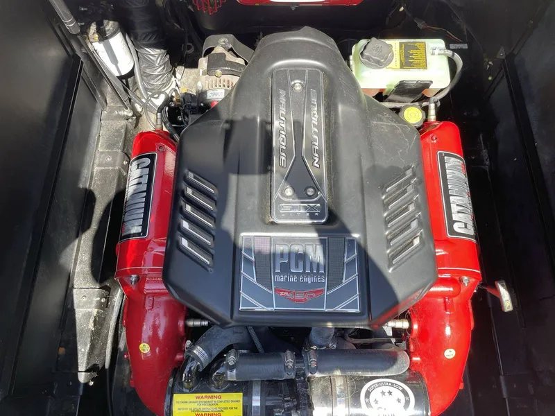 Slide: The Image of Engine compartment of a 2015 Nautique G25 with PCM engine. - 21
