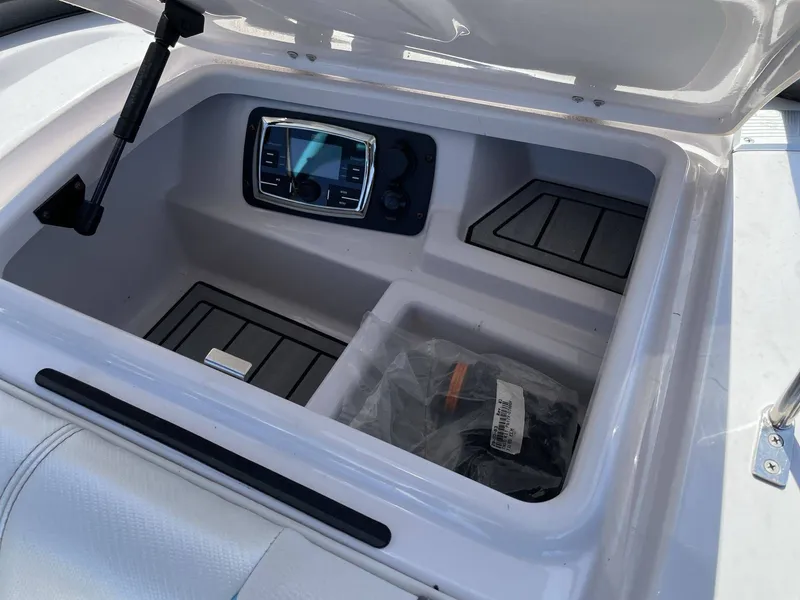 Slide: The Image of Storage compartment in Nautique G25 boat, 2015 model. - 23