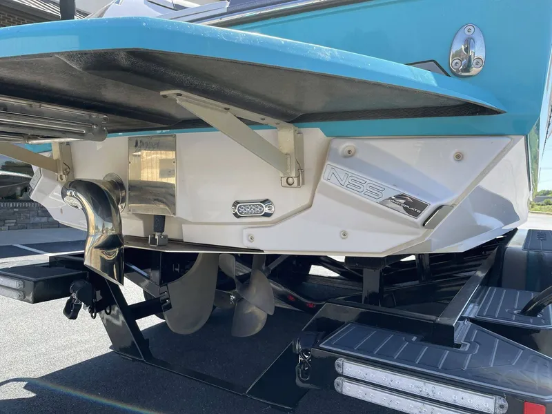 Slide: The Image of Rear view of a 2015 Nautique G25 boat with NSS system. - 9