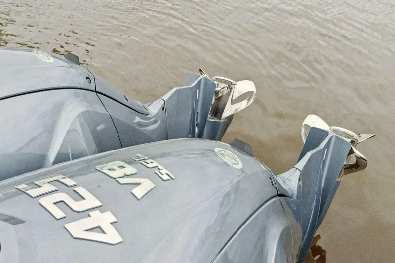 Slide: The Image of Twin outboard engines on a 2022 Jeanneau Leader 10.5 WA Series 2 boat. - 21