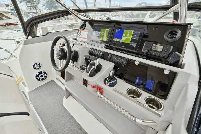 Slide: The Image of Cockpit of 2022 Jeanneau Leader 10.5 WA Series 2 with modern navigation equipment. - 9