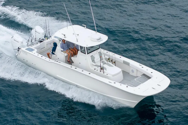 Slide: The Image of 2026 Tideline 365 Offshore boat cruising on open water with passengers onboard. - 24