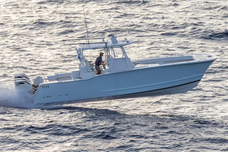 Slide: The Image of 2026 Tideline 365 Offshore boat cruising on open water. - 29