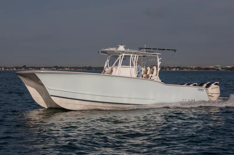 Slide: The Image of 2026 Tideline 365 Offshore boat cruising on open water. - 35