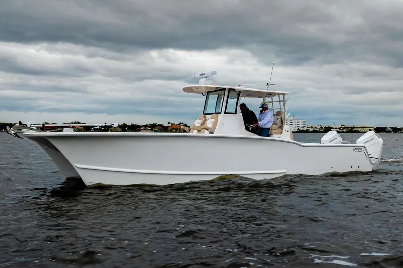 Slide: The Image of 2026 Tideline 365 Offshore boat cruising on a cloudy day. - 38