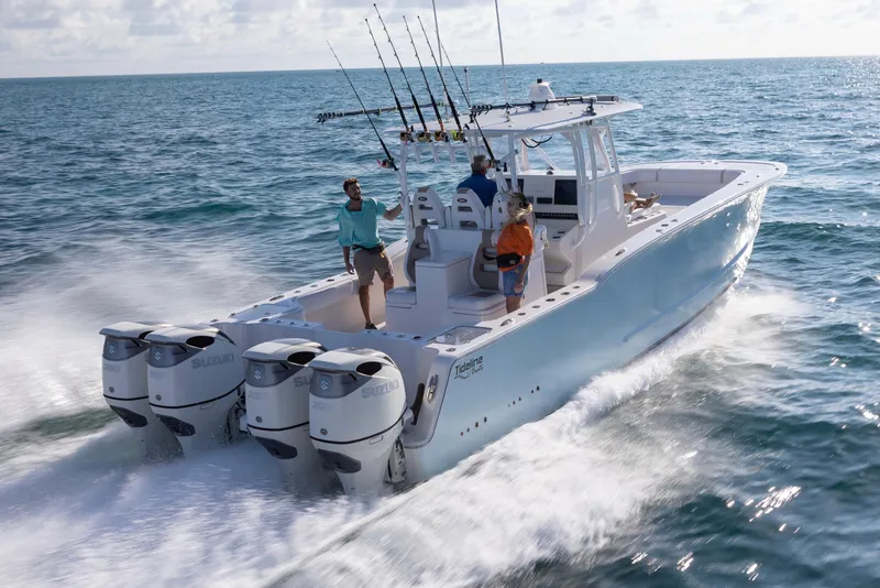 Slide: The Image of 2026 Tideline 365 Offshore boat cruising on open water with multiple passengers. - 43