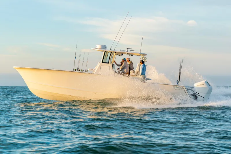 Slide: The Image of 2026 Tideline 365 Offshore boat cruising on open water at high speed. - 46