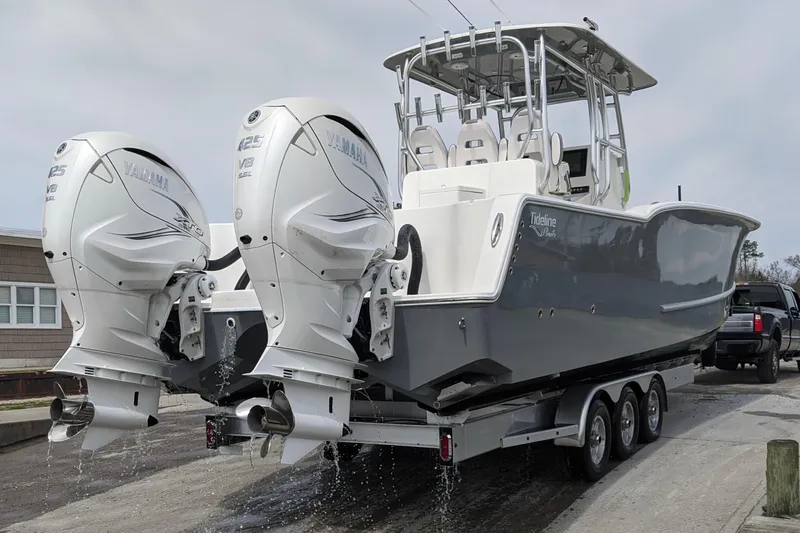 Slide: The Image of 2026 Tideline 365 Offshore boat with dual Yamaha 425 V8 engines on a trailer. - 51