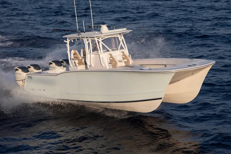 Slide: The Image of 2026 Tideline 365 Offshore boat cruising on open water. - 8