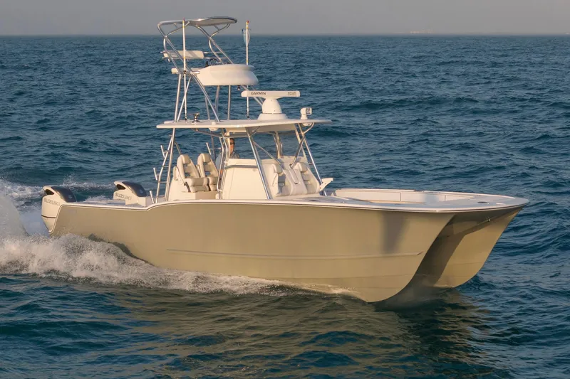 Slide: The Image of 2026 Tideline 365 Offshore boat cruising on open water. - 9