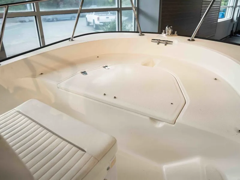 Slide: The Image of Interior view of a 2014 Boston Whaler 150 Montauk boat. - 7