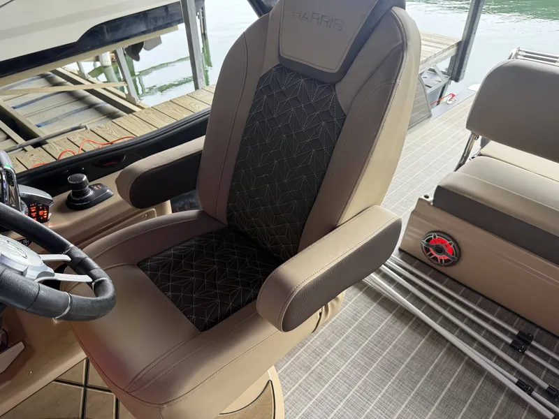 Slide: The Image of Harris 270GM 2023 boat seat with armrests and modern design. - 13