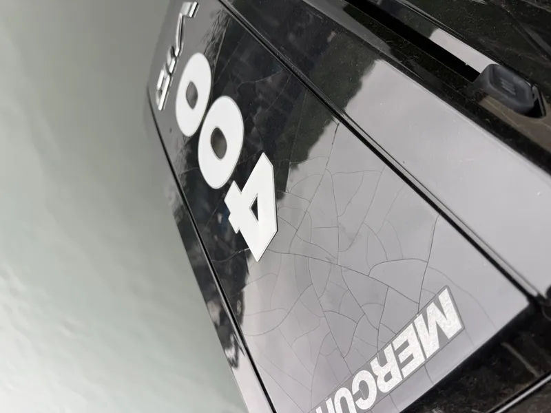 Slide: The Image of Close-up of a Mercury 400 outboard motor, Harris 270GM model, year 2023. - 30